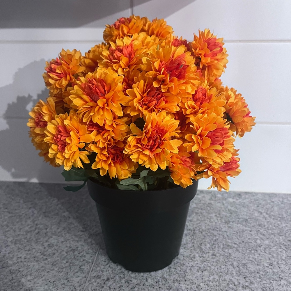 Vibrant Orange Artificial Flowers in Pot